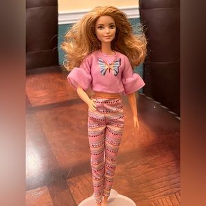 Tall, fashionista, Barbie! With butterfly shirt and curly hair